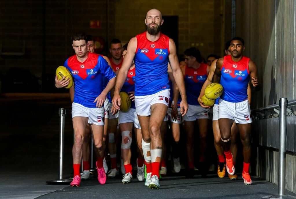 Max Gawn leads Melbourne Demons onto the field